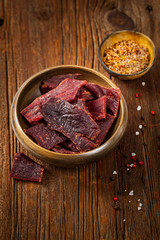 Delicious Homemade Beef Jerky Background. Selective focus.