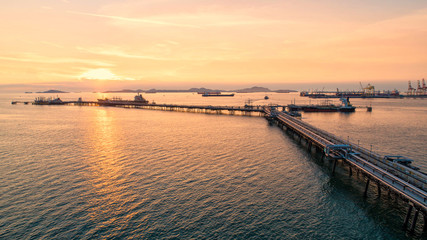 Fototapeta na wymiar oil tanker, gas tanker in the high sea.Refinery Industry cargo ship,aerial view,Thailand, in import export, LPG,oil refinery, Logistics and transportation with working crane bridge in harbor