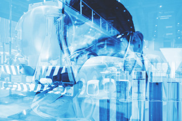 Double exposure Oil Research Scientist with oil tank, science concept.