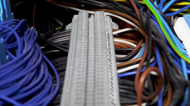4K slider shot of wires of an programmable logic controller