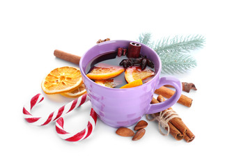 Cup of delicious mulled wine on white background