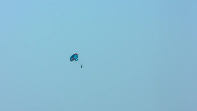 Parachute flight by boat