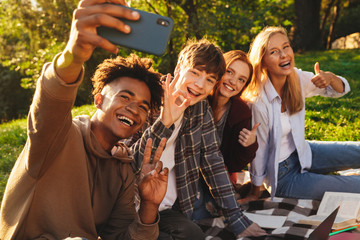 Group of joyful multhiethnic students