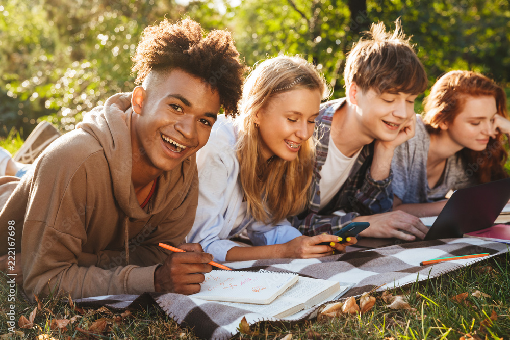 Wall mural Group of cheerful multhiethnic students