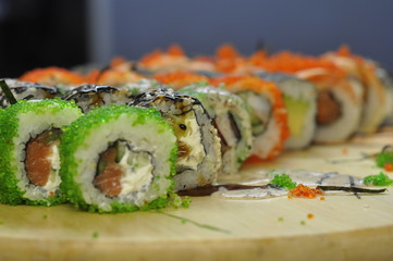 food, sushi, fish, rice, japanese, roll, meal, salmon, dinner, seafood, gourmet, japan, cuisine, maki, healthy, lunch, raw, traditional, asia, dish, fresh, white, plate, meat, snack