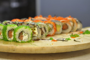 food, sushi, fish, rice, japanese, roll, meal, salmon, dinner, seafood, gourmet, japan, cuisine, maki, healthy, lunch, raw, traditional, asia, dish, fresh, white, plate, meat, snack