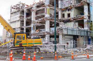 Destruction of concrete building, construction site