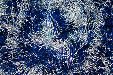 happy new year christmas holiday geranium tinsel christmas trees cones balls yellow blue background