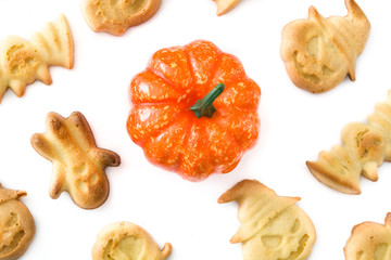 Halloween cookies and pumpkin isolated on white background

