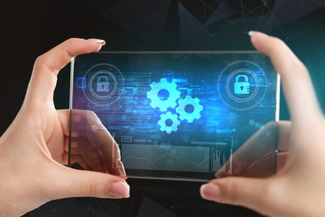 The concept of business, technology, the Internet and the network. A young entrepreneur working on...