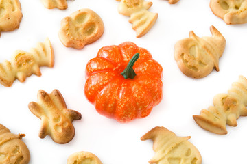 Halloween cookies and pumpkin isolated on white background

