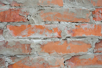 brick wall with traces of cement