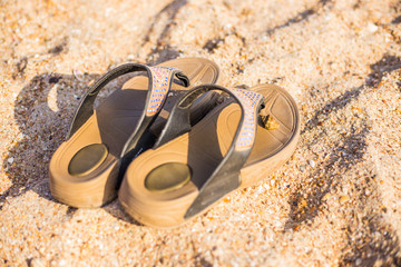 beach flip-flops on the sand