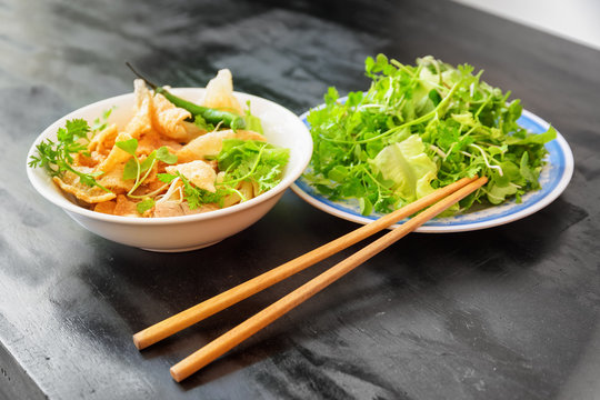 Cao Lau on table of street cafe, Hoi An