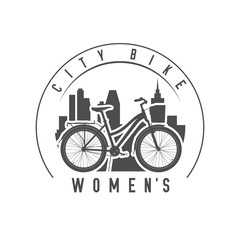 Lady or Women City Comfort Bike with a Basket and Trunk Emblem, Badge. Monochrome Vector Illustration. Lady or Women Bicycle Detailed Silhouette.