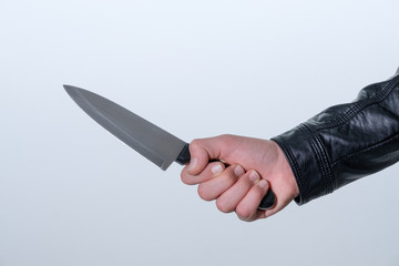 Messerangriff: Hand mit Messer