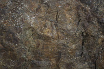 Grunge stone background. Rocky surface. Brown stone background.