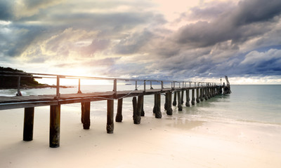 Fototapeta premium Sea wooden bridge in the morning
