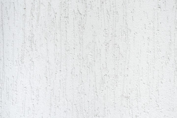 Close up photo of abstract striped white stucco texture and background