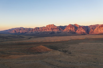 Aerial View Sunrise Lighting Mountains in Red Rock National Conservation Area, NV