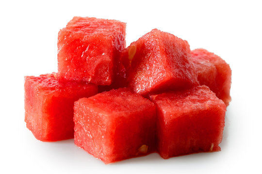 Pile Of Seedless Watermelon Cubes Isolated On White.