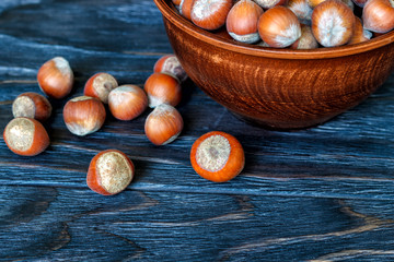 whole hazelnuts on the background of a wooden table