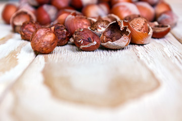 whole hazelnuts on the background of a wooden table