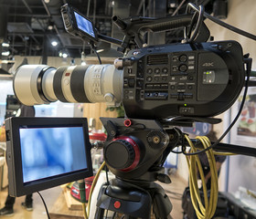 Professional tv camera in live show pavilion.