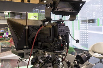 Professional tv camera in live show pavilion.