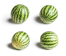 Set of four ripe green watermelon fruits. Isolated on white background