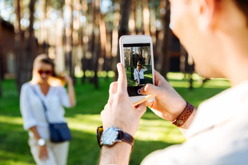 Mobile camera. Selective focus of a smartphone screen being used for taking photos