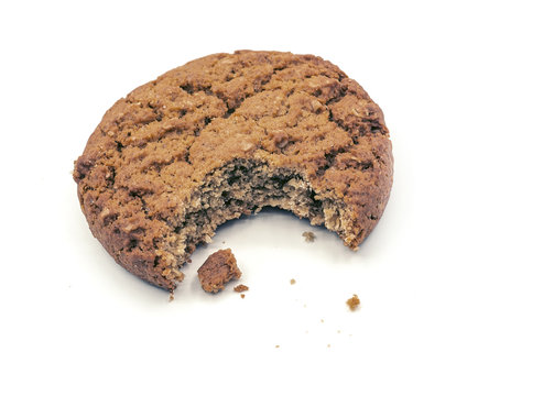 biten oatmeal cookies on white