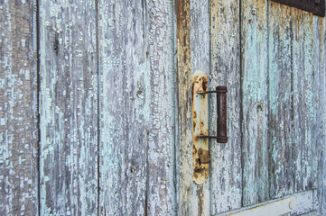 old wooden door, peeling off paint