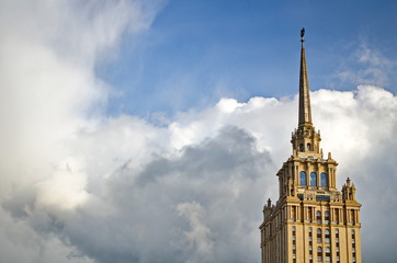 Fototapeta na wymiar The spire of a high-rise building in the city of Moscow of the Stalin era