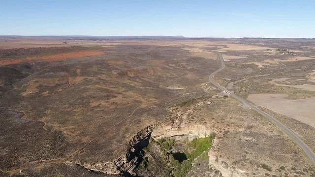 Aerial views over the town of Nieuwoudtville in the Northern Cape of South Africa with blossoming March flowers and the stunning landscape of the plato