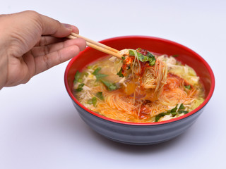 a cup of mee-hoon soup isolated on the white background