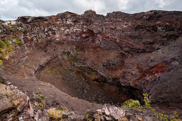 Look into the deep crater of Mauna Ulu, Hawaii.