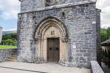 Fototapeta na wymiar Entrance of the church of Santiago in Roncesvalles. Navarre Spain