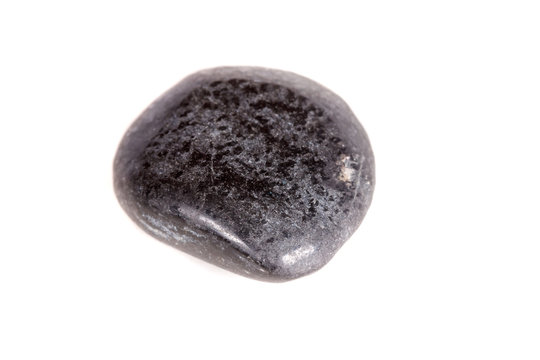 Macro mineral stone lignite on a white background