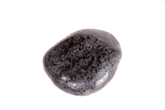 Macro mineral stone lignite on a white background