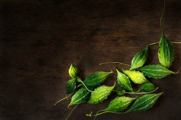 Bitter gourd fruits on wooden  floor.