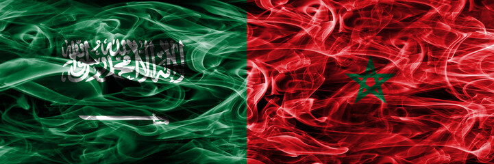 Saudi Arabia vs Morocco smoke flags placed side by side. Thick colored silky smoke flags of Saudi Arabia and Morocco.