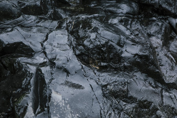 Wet  black rock