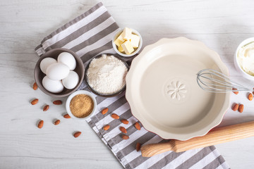 Homemade cooking ingredients and utensils on kitchen table