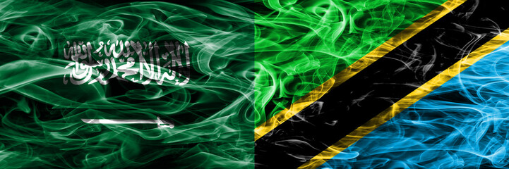 Saudi Arabia vs Tanzania smoke flags placed side by side. Thick colored silky smoke flags of Saudi Arabia and Tanzania.