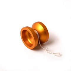 orange metal yo-yo on a white background