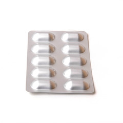 pills in packaging on a white background