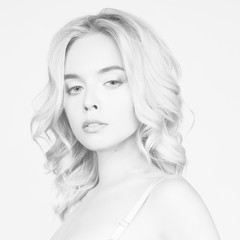 Fototapeta premium Young beautiful blonde with retro hairstyle