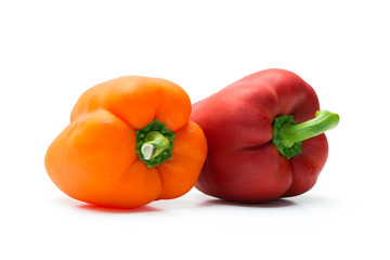 Red and orange pepper bell or paprika isolated on white background