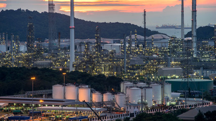 Beautiful sunset  petrochemical oil refinery factory plant cityscape of Chonburi province at night  , landscape Thailand